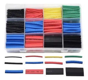 Kit termoencogible 530 piezas en estuche organizador con compartimentos de colores rojo, verde, azul, negro y amarillo
